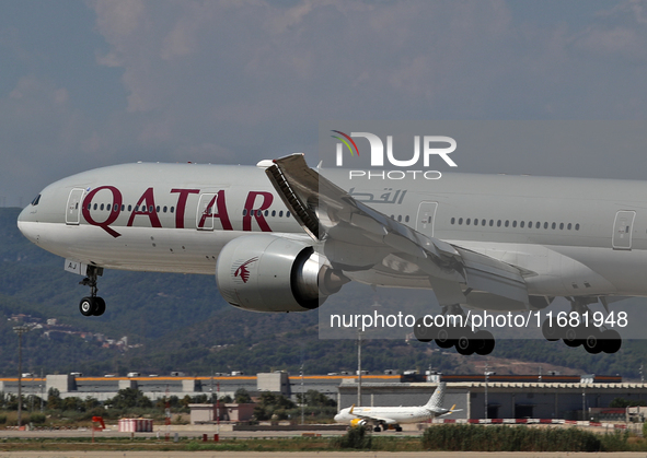 A Boeing 777-3DZ(ER) from Qatar Airways lands at Barcelona airport in Barcelona, Spain, on September 2, 2024. 