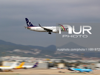 A Boeing 737 MAX 8 from LOT company lands at Barcelona airport in Barcelona, Spain, on October 15, 2024. (