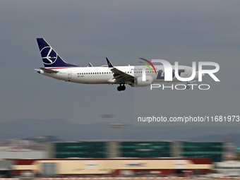 A Boeing 737 MAX 8 from LOT company lands at Barcelona airport in Barcelona, Spain, on October 15, 2024. (