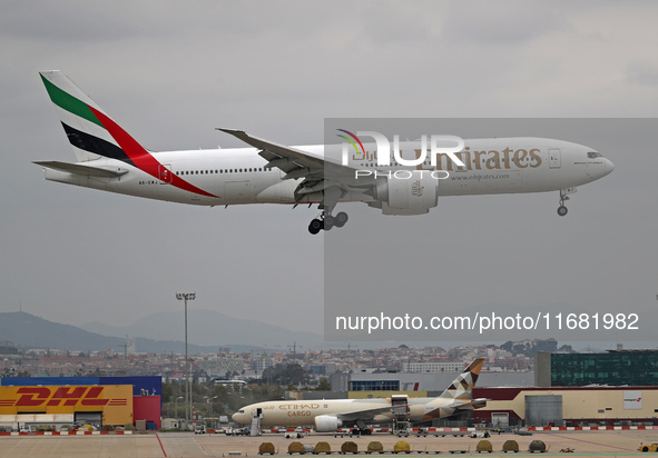 A Boeing 777-21H(LR) from Emirates lands at Barcelona airport in Barcelona, Spain, on October 15, 2024. 