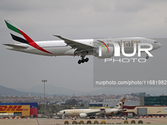 A Boeing 777-21H(LR) from Emirates lands at Barcelona airport in Barcelona, Spain, on October 15, 2024. (