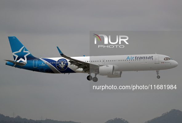 An Airbus A321-271NX from Air Transat, featuring a CF Montreal sticker, lands at Barcelona airport in Barcelona, Spain, on October 15, 2024....