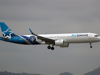 An Airbus A321-271NX from Air Transat, featuring a CF Montreal sticker, lands at Barcelona airport in Barcelona, Spain, on October 15, 2024....