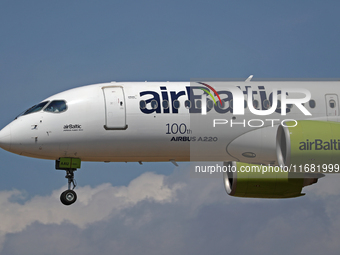 An Airbus A220-300 from Air Baltic, featuring the 100th A220 sticker, lands at Barcelona airport in Barcelona, Spain, on August 30, 2024. (