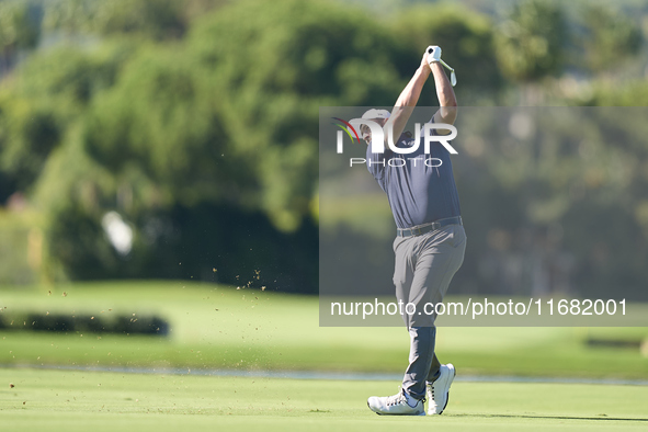 Jon Rahm of Spain plays his second shot on the 14th hole on the third day of the Estrella Damm N.A. Andalucia Masters 2024 at Real Club de G...