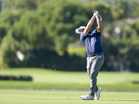 Jon Rahm of Spain plays his second shot on the 14th hole on the third day of the Estrella Damm N.A. Andalucia Masters 2024 at Real Club de G...