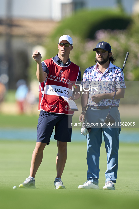 Angel Hidalgo of Spain talks with his caddie on the 14th hole on the third day of the Estrella Damm N.A. Andalucia Masters 2024 at Real Club...