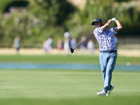 Angel Hidalgo of Spain plays his second shot on the 14th hole on the third day of the Estrella Damm N.A. Andalucia Masters 2024 at Real Club...