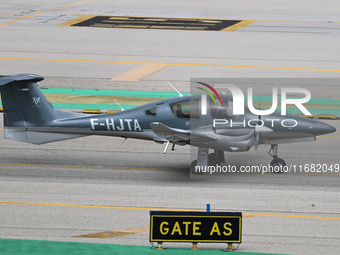 A Diamond DA62 from a private company prepares for takeoff on the runway at Barcelona Airport in Barcelona, Spain, on October 15, 2024. (