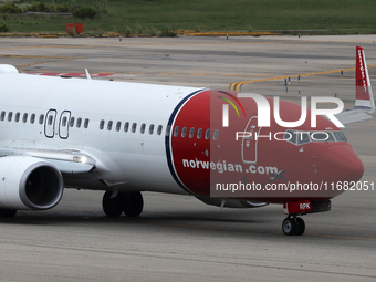 A Boeing 737-8JP from the Norwegian company prepares for takeoff on the runway at the airport in Barcelona, Spain, on October 15, 2024. (