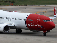 A Boeing 737-8JP from the Norwegian company prepares for takeoff on the runway at the airport in Barcelona, Spain, on October 15, 2024. (