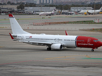 A Boeing 737-8JP from the Norwegian company prepares for takeoff on the runway at the airport in Barcelona, Spain, on October 15, 2024. (