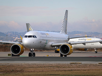 An Airbus A320-271N from Vueling (Asturias Paraiso Natural Sticker) prepares for takeoff on the Barcelona airport runway in Barcelona, Spain...