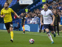 George Johnston #6 of Bolton Wanderers F.C. is in possession of the ball during the Sky Bet League 1 match between Bolton Wanderers and Burt...