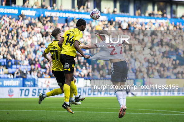 Nicholas Akoto #14 of Burton Albion F.C. clears the area during the Sky Bet League 1 match between Bolton Wanderers and Burton Albion at the...