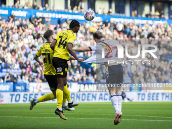 Nicholas Akoto #14 of Burton Albion F.C. clears the area during the Sky Bet League 1 match between Bolton Wanderers and Burton Albion at the...