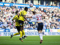 Nicholas Akoto #14 of Burton Albion F.C. clears the area during the Sky Bet League 1 match between Bolton Wanderers and Burton Albion at the...