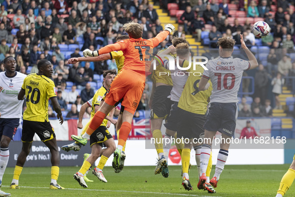 Harvey Isted #13 (GK) of Burton Albion F.C. makes a save during the Sky Bet League 1 match between Bolton Wanderers and Burton Albion at the...