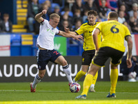 Kyle Dempsey #22 of Bolton Wanderers F.C. is in action during the Sky Bet League 1 match between Bolton Wanderers and Burton Albion at the T...