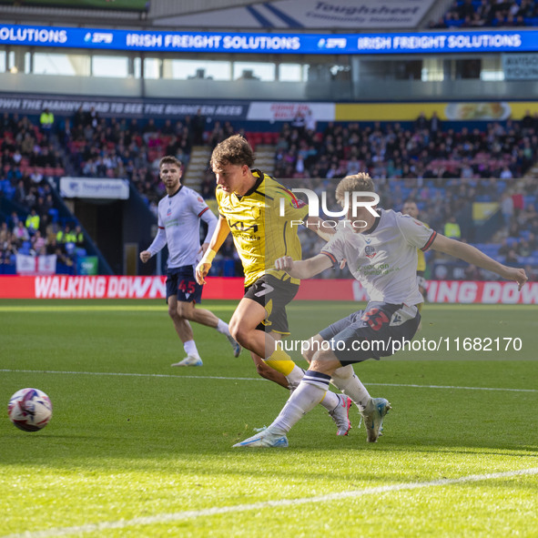 Szabolcs Schon #23 of Bolton Wanderers F.C. takes a shot at goal during the Sky Bet League 1 match between Bolton Wanderers and Burton Albio...