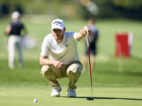 Rasmus Hojgaard of Denmark studies his shot on the 14th green on the third day of the Estrella Damm N.A. Andalucia Masters 2024 at Real Club...