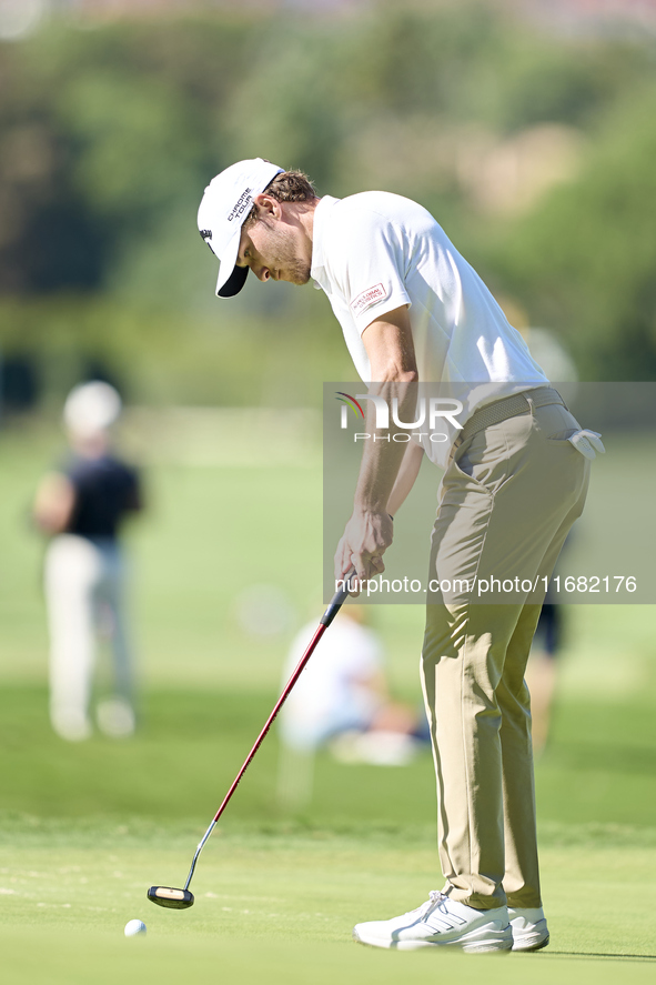 Rasmus Hojgaard of Denmark plays a shot on the 14th green on the third day of the Estrella Damm N.A. Andalucia Masters 2024 at Real Club de...