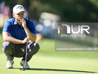 Daniel Gavins of England studies his shot on the 14th green on the third day of the Estrella Damm N.A. Andalucia Masters 2024 at Real Club d...