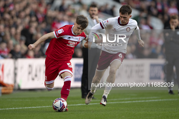 Ben Doak of Middlesbrough takes on Max Bird of Bristol City during the Sky Bet Championship match between Middlesbrough and Bristol City at...