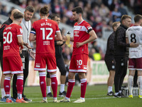 Middlesbrough Manager Michael Carrick discusses tactics with his players during the Sky Bet Championship match between Middlesbrough and Bri...