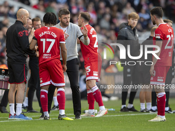 Middlesbrough Manager Michael Carrick discusses tactics with his players during the Sky Bet Championship match between Middlesbrough and Bri...