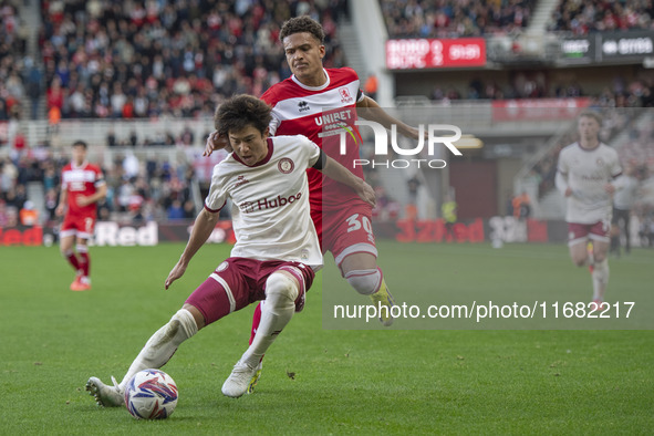 Bristol City's Yu Hirakawa shields the ball from Middlesbrough's Neto Borges during the Sky Bet Championship match between Middlesbrough and...