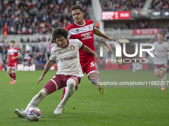 Bristol City's Yu Hirakawa shields the ball from Middlesbrough's Neto Borges during the Sky Bet Championship match between Middlesbrough and...