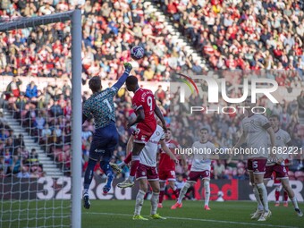 Bristol City goalkeeper Max O'Leary punches clear under pressure from Middlesbrough's Emmanuel Latte Lath during the Sky Bet Championship ma...