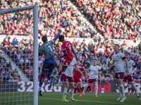 Bristol City goalkeeper Max O'Leary punches clear under pressure from Middlesbrough's Emmanuel Latte Lath during the Sky Bet Championship ma...