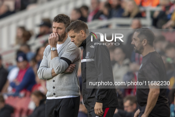 Middlesbrough Manager Michael Carrick discusses options with his assistant Jonathan Woodgate during the Sky Bet Championship match between M...