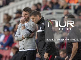 Middlesbrough Manager Michael Carrick discusses options with his assistant Jonathan Woodgate during the Sky Bet Championship match between M...