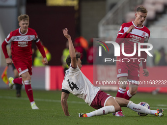 Marcus Forss of Middlesbrough is tackled by Kal Naismith of Bristol City during the Sky Bet Championship match between Middlesbrough and Bri...