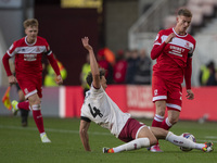 Marcus Forss of Middlesbrough is tackled by Kal Naismith of Bristol City during the Sky Bet Championship match between Middlesbrough and Bri...