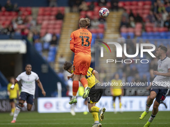 Harvey Isted #13 (GK) of Burton Albion F.C. makes a save during the Sky Bet League 1 match between Bolton Wanderers and Burton Albion at the...