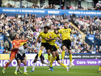 Jack Cooper Love #16 of Burton Albion F.C. clears the area during the Sky Bet League 1 match between Bolton Wanderers and Burton Albion at t...