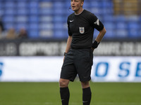 Referee Martin Coy officiates the Sky Bet League 1 match between Bolton Wanderers and Burton Albion at the Toughsheet Stadium in Bolton, Eng...