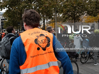 A man wears a shirt of the movement MDB during a gathering at the Place de La Republique in Paris, France, on October 19, 2024, to pay tribu...