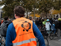 A man wears a shirt of the movement MDB during a gathering at the Place de La Republique in Paris, France, on October 19, 2024, to pay tribu...