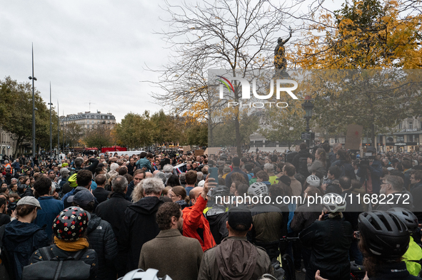 People gather at the Place de La Republique in Paris, France, on October 19, 2024, to pay tribute to Paul, a 27-year-old cyclist who dies af...