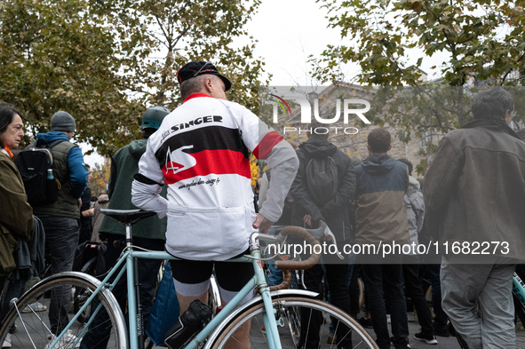 People gather at the Place de La Republique in Paris, France, on October 19, 2024, to pay tribute to Paul, a 27-year-old cyclist who dies af...