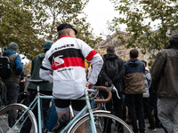 People gather at the Place de La Republique in Paris, France, on October 19, 2024, to pay tribute to Paul, a 27-year-old cyclist who dies af...