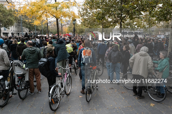 People gather at the Place de La Republique in Paris, France, on October 19, 2024, to pay tribute to Paul, a 27-year-old cyclist who dies af...