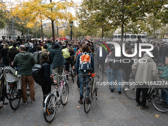 People gather at the Place de La Republique in Paris, France, on October 19, 2024, to pay tribute to Paul, a 27-year-old cyclist who dies af...