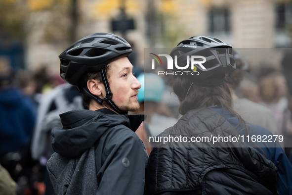 People gather at the Place de La Republique in Paris, France, on October 19, 2024, to pay tribute to Paul, a 27-year-old cyclist who dies af...