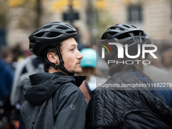 People gather at the Place de La Republique in Paris, France, on October 19, 2024, to pay tribute to Paul, a 27-year-old cyclist who dies af...